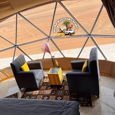 an overhead view of a living room with two chairs at Valera wadi rum Luxury in Wadi Rum