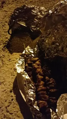 a piece of meat wrapped in tin foil at bedouin hostel in Amman