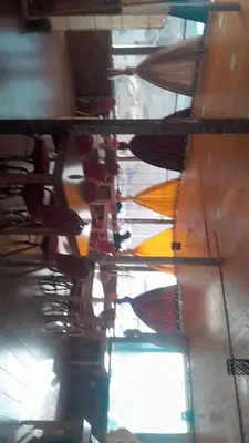 a reflection of the ceiling of a room with umbrellas at Gorge home in Amman