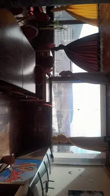 a view from the inside of a room with a window at Gorge home in Amman