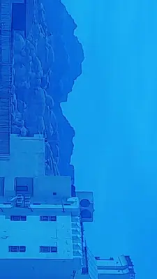 a view of a building with a blue background at Gorge home in Amman