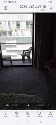 a view of a window with a bench in a room at برج داماك الطابق in Amman