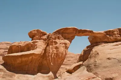 a view of a rock formation in the desert at Panorama Wadi Rum Sunset Camp in Wadi Rum