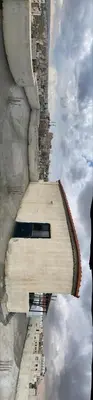 an overhead view of a tall building with a window at Osama Alnaser in Amman