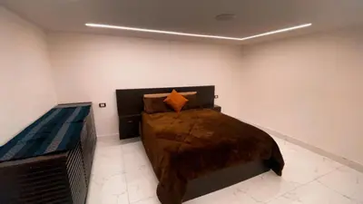 a bedroom with a bed in a room at CityHaven in Amman