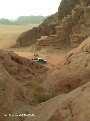 a car parked in the middle of a desert at Ragheb Al-Zawaida in Disah