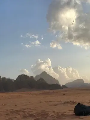 a view of the desert with mountains in the background at Ragheb Al-Zawaida in Disah