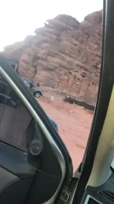 a view of a canyon from a car window at Ragheb Al-Zawaida in Disah