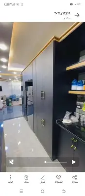 a kitchen with two lockers in a room at فيلا اربد طريق البترول in Juḩfīyah