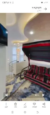 a picture of a bed in a room at فيلا اربد طريق البترول in Juḩfīyah