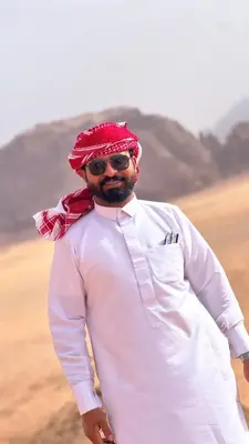 a man wearing a red bow tie and sunglasses at Rum drone tours in Aqaba