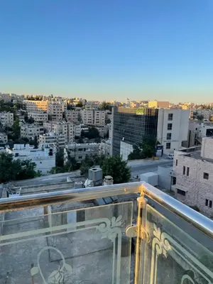 a view of a city from the roof of a building at Sawa Apartment in Amman