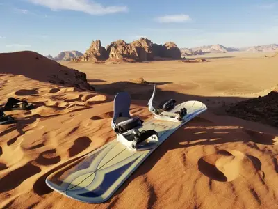 a snowboard laying on the sand in the desert at Wadi Rum 5-hour tour with sunset or morning, overnight stay with two meals and a Bedouin tent with a private bathroom Prices are for two people in Wadi Rum