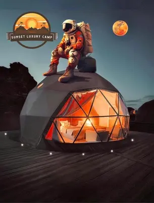 a man is standing on top of a tent at RUM SUNSET BUBBLES lUXURY CAMP in Wadi Rum
