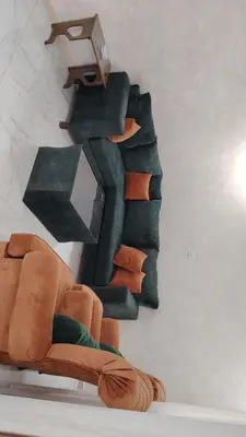 a painting of a chair on a wall at Al Wesam Furnished Apartments in Aqaba