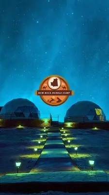 a sign for a hotel on a beach at night at RUM ROZA BUBBLES lUXURY CAMP in Wadi Rum