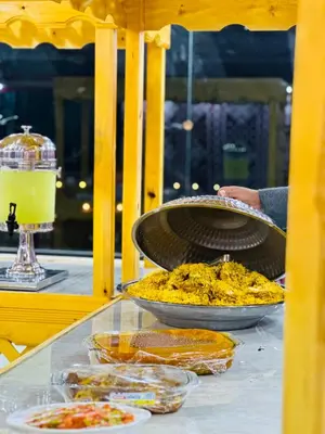 a table with two bowls of food on a table at Wadi Rum party luxury camp in Disah