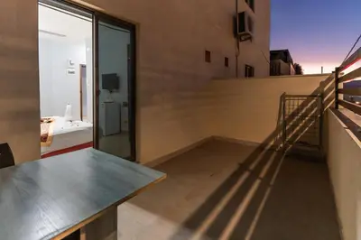 a house with a view of a balcony at Old town apartment 2 in Aqaba