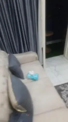 a white couch with a blue wrapper on it at الجفر موتل in Al Jafr