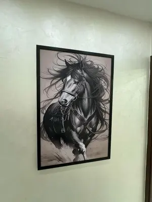 a painting of a horse running on a wall at Third circle Luxury Hotel apartment New in Amman