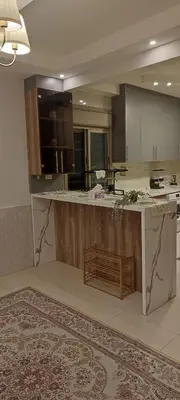 a large kitchen with a large island in the middle at شقة مفروشة للايجار دوار المشاغل شارع الأقصى in Amman