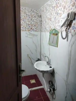 a bathroom with a sink and a toilet at شقة الراحة والسعادة economic comfortable flat first floor in Amman