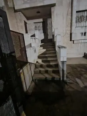 a view of a staircase in a building at شقة مفروشة مدخل مستقل in Jurf ad Darāwīsh