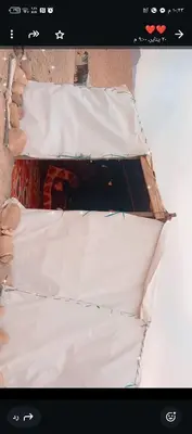 a pile of white paper on top of a building at Dana to explore Bedouin life in Dana