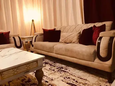 a living room with a couch and a table at July house in Wadi Musa