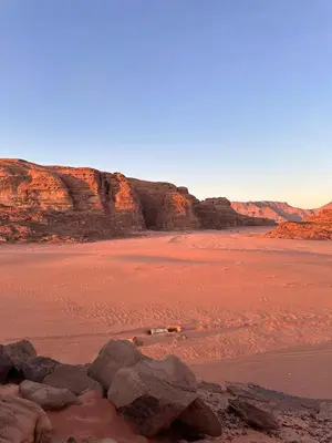 a view of a desert with rocks and mountains at Luxury Desert Camp in Disah