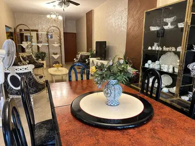 a vase of flowers on a table in a room at شقة مفروشة في حي نزال Furnished Apartment Hay Nazzal in Amman