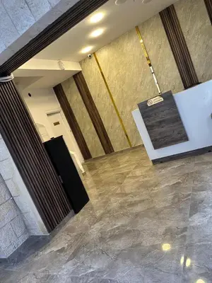 a view of a room with a stage in a building at Gate Inn in Amman