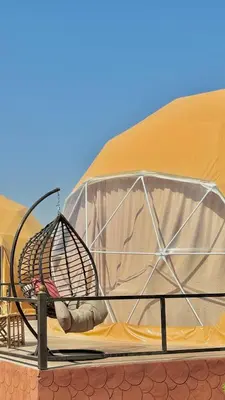 a inside of a tent with a cage at Nova Luxury Camp in Wadi Rum
