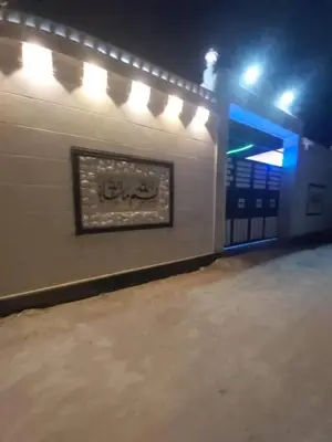 a sign on a wall in a subway station at الزئبق فارم in Maḩaţţat al Ḩafīf