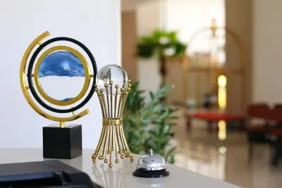 a mirror sitting on top of a table at Ailana Hotel in Aqaba