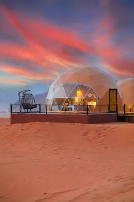 a picture of a dome house in the desert at Whispers of Night Camp in Jurf ad Darāwīsh