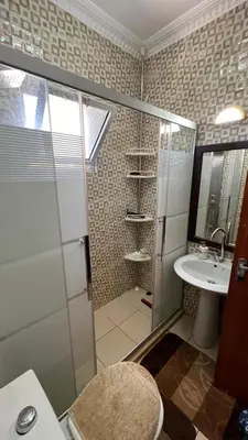 a bathroom with a shower and a sink at Royal in Aqaba