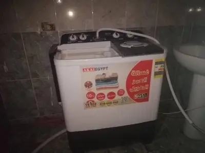 a stove in a bathroom next to a toilet at البويضه هاوس in Al Buwayḑah