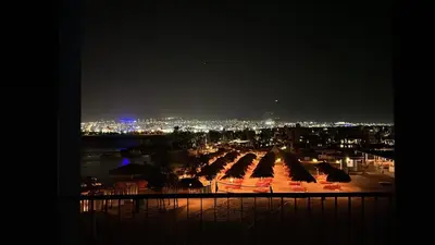 a view of a parking lot at night at Ayla Beach Apartment Azure 1522 Families only in Aqaba