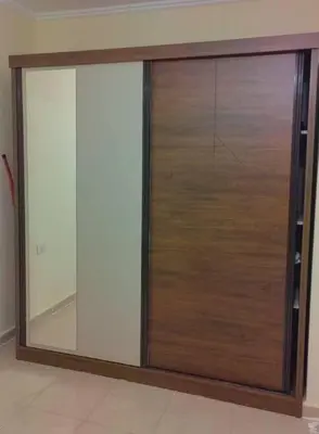 a large sliding glass door in a room at الجبل الاخضر هاوس in Al ‘Ālūk