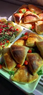 a plate of food on a table at الازرق فارم in Al Azraq ash Shamālī