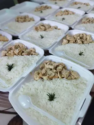 a group of containers filled with rice and mushrooms at صبحه هاوس in Şabḩā