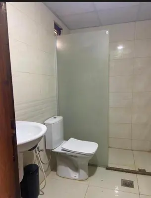 a bathroom with a toilet and a sink at RUM DREAM CITY lUXURY CAMP in Wadi Rum