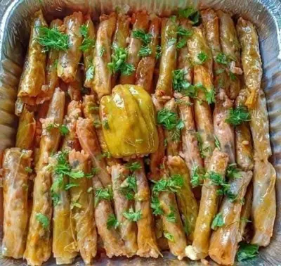 a pile ofsticks with parsley on top in a bowl at شقه الحنان in Dayr as Si‘nah