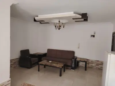 a living room with a couch and a table at الخليل 3 in Irbid