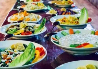 a bunch of plates of food on a table at Rum Sky Experiences in Wadi Rum