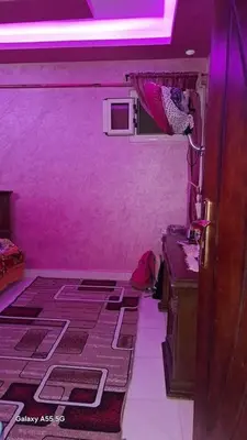 a room with pink walls and a purple ceiling at الزواهره هاوس in Az Zarqa