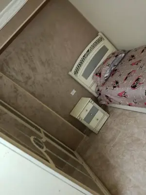 an overhead view of a bedroom with a bed at رميمين هاوس