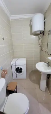 a small bathroom with a toilet and a sink at النخبة للشقق الفندقية AlNukhba suites in Irbid