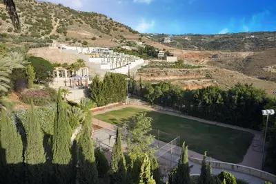 an aerial view of a park in a mountain at Luxurious private villa in Mahis in Māḩiş